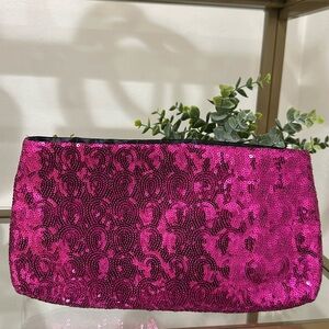 Pink sequin clutch bag
